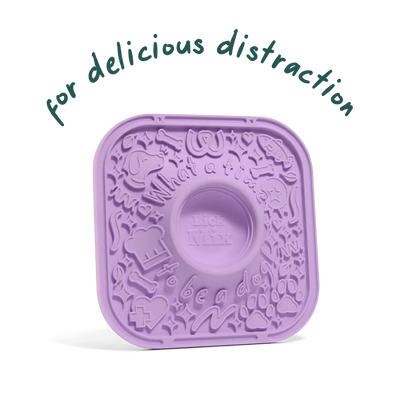Lavender Woof dog LickMat with textured silicone surface and built-in mixing bowl