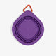 Zee.Dog GoBowl in Peak purple shown folded flat with an orange carabiner